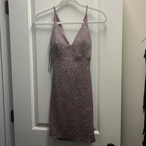 Party dress, very sparkly and flattering droopy back